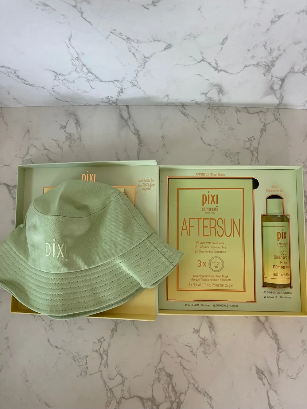 Pixi AfterSun Skincare Set with Mint Green Hat and Cleansing Oil